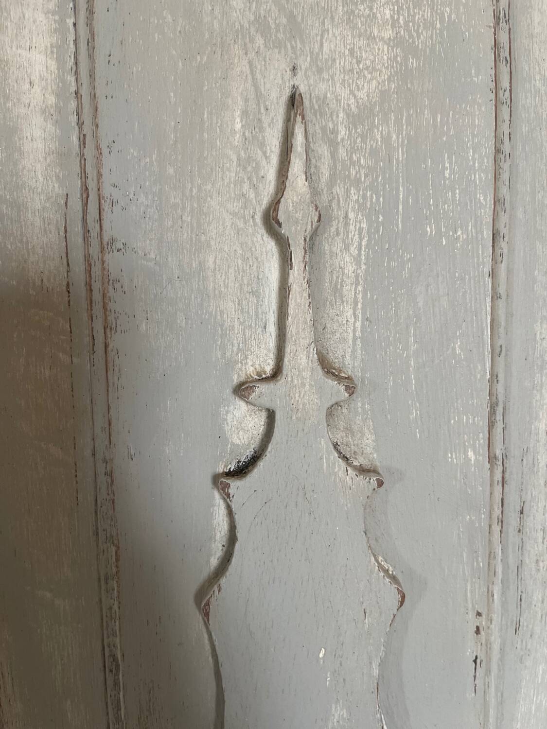 Old-fashioned patinated wooden pediment