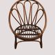 Fauteuil corbeille vintage en rotin à dossier soleil – Style Riviera, année