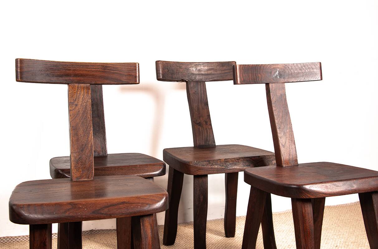 Set of 4 Scandinavian chairs in solid Elm, model T in the style of Olavi Hannin.