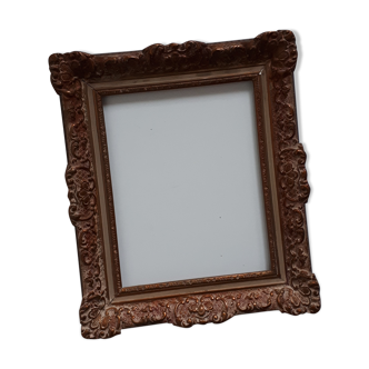 Empty gilded baroque frame