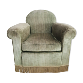 Fringed velvet armchair