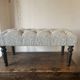 Tufted footrest