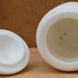 Old white marble pot