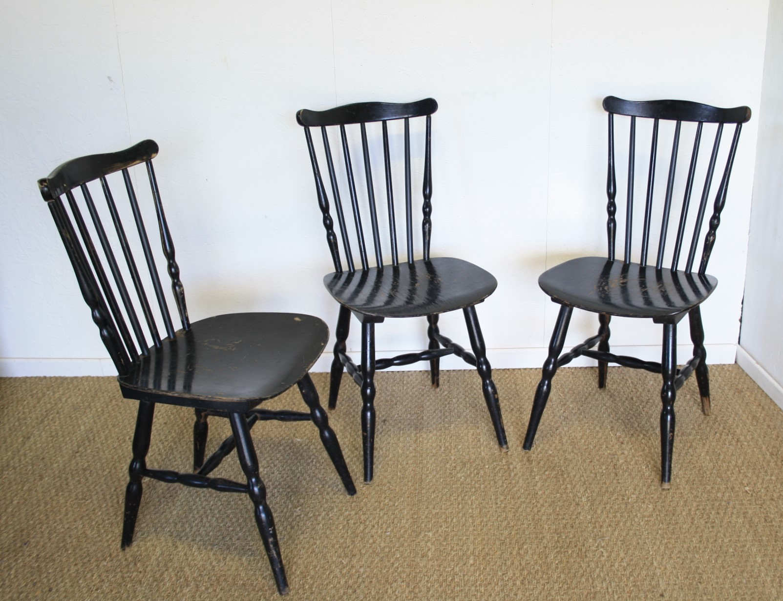 Three black Baumann bistro chairs