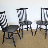 Three black Baumann bistro chairs