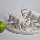 Saxon porcelain group, two fighting goats, signed Röhle, 1900