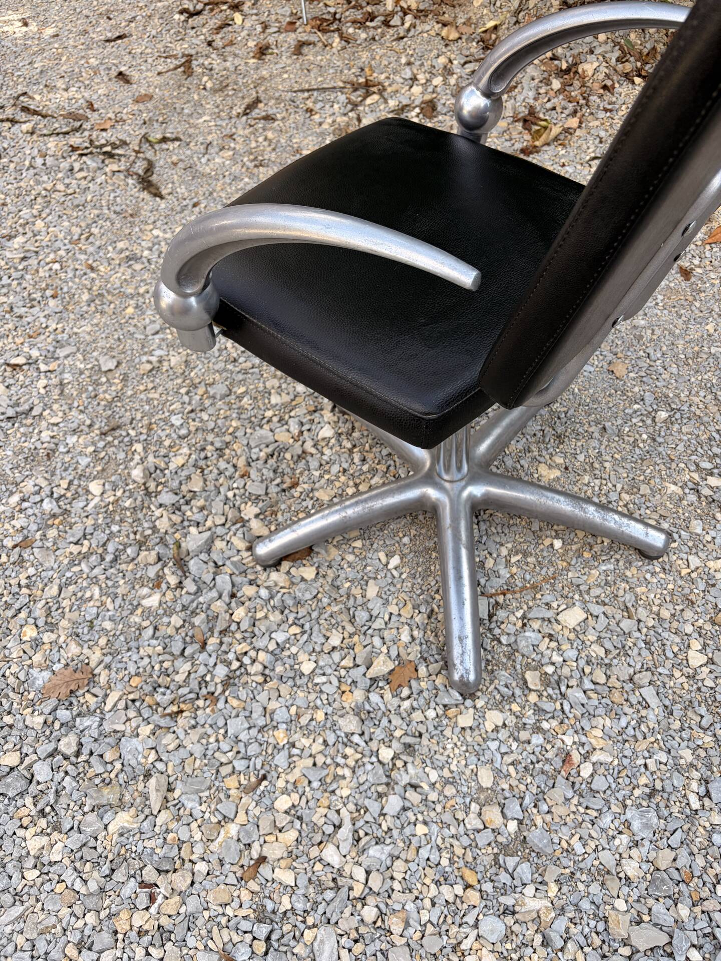 Futuristic 90s style hairdresser's chair