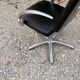 Futuristic 90s style hairdresser's chair