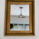 Antique mirror in gilded and copper wood