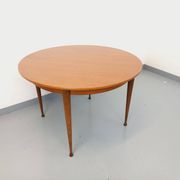Round dining table in vintage Scandinavian style from the 50s and 60s in teak.