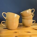 Jug and 5 cups in orange stoneware, very good condition, signed and numbered