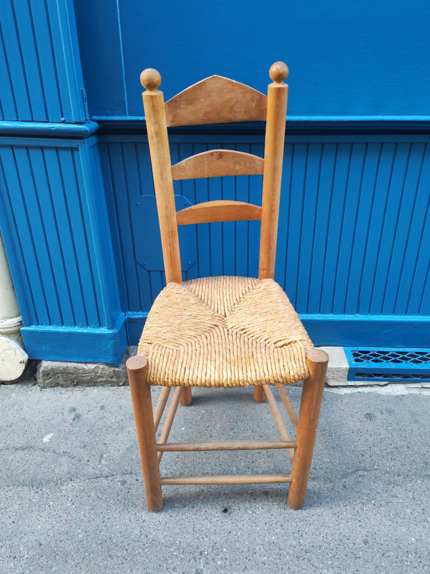 Neo-rustic chair in wood and wicker in the brutalist style by Charles Dudyoyut.