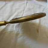 Art Deco era brass hand mirror