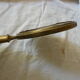 Art Deco era brass hand mirror