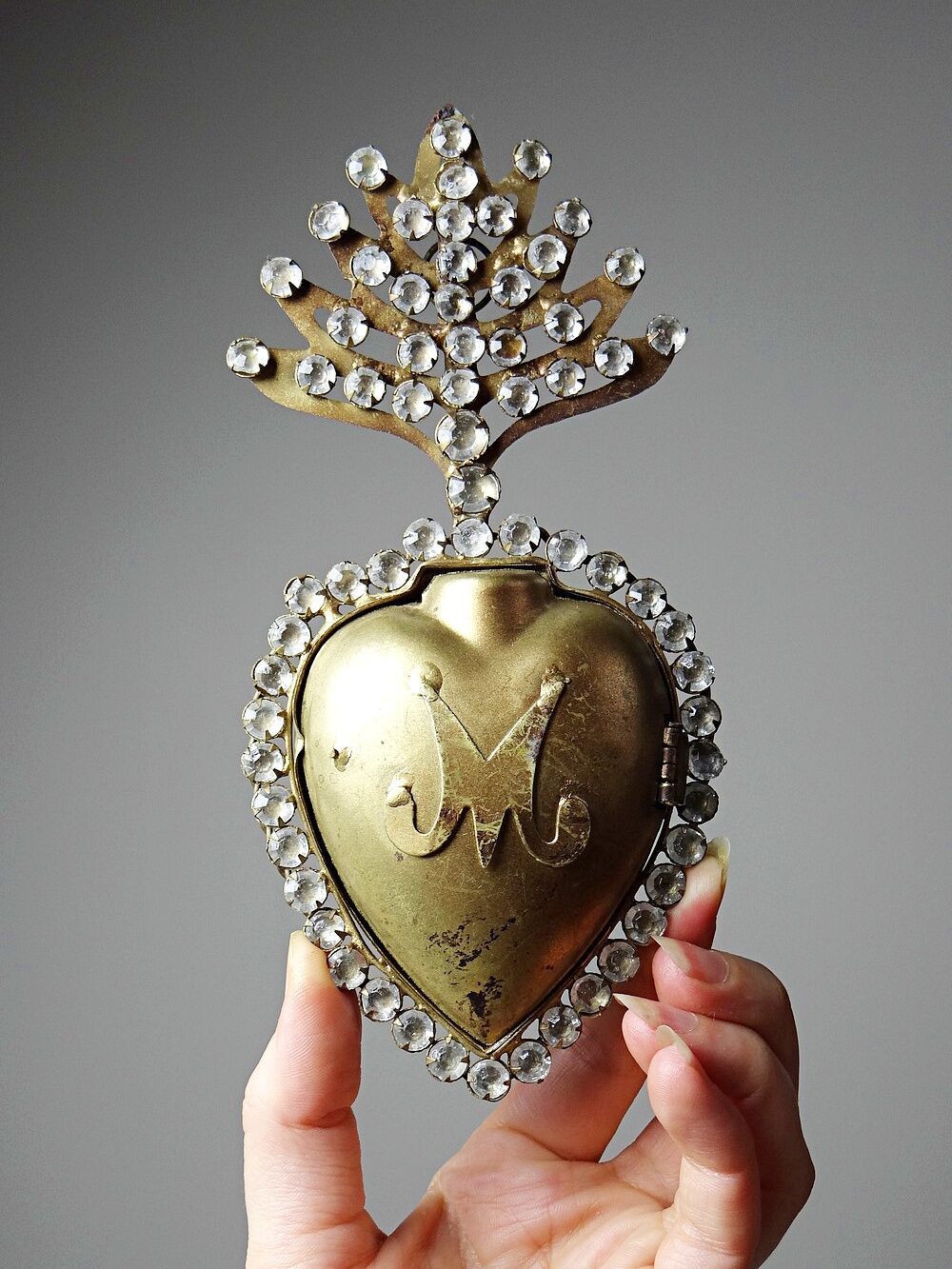 Ancient ex-voto of a flaming heart of Mary, adorned with rhinestones, 19th-20th century.