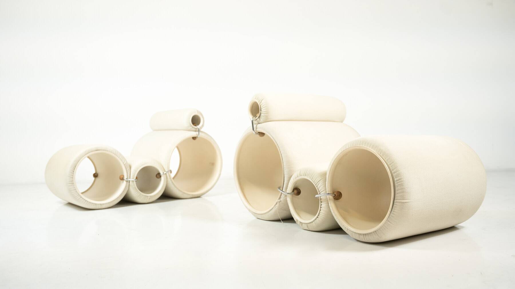 Pair of Tube Armchairs by Joe Colombo for Flexform, first edition.