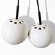 Two white metal globe pendant lights, 1970s.