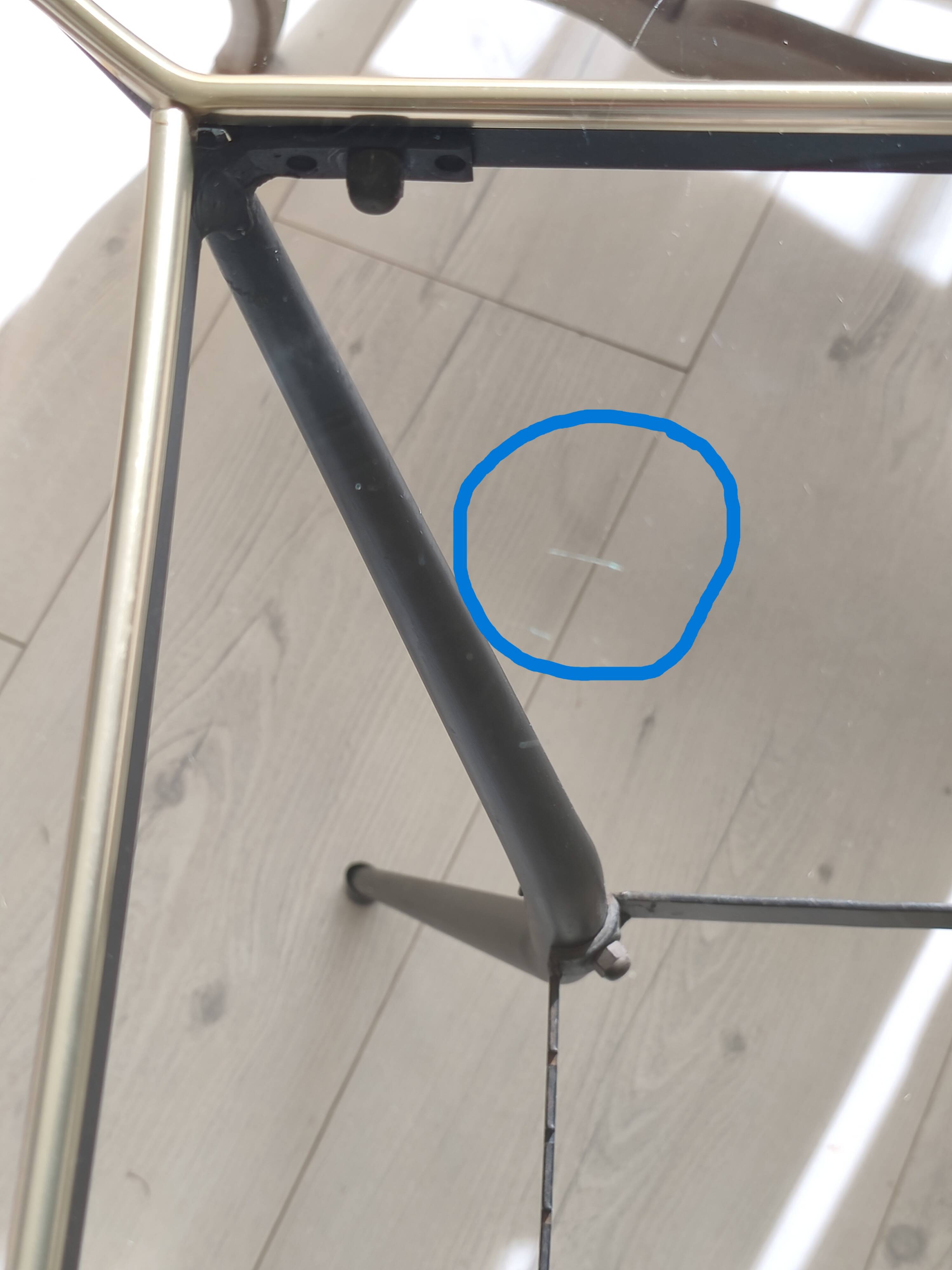 Antique side table made of metal and glass