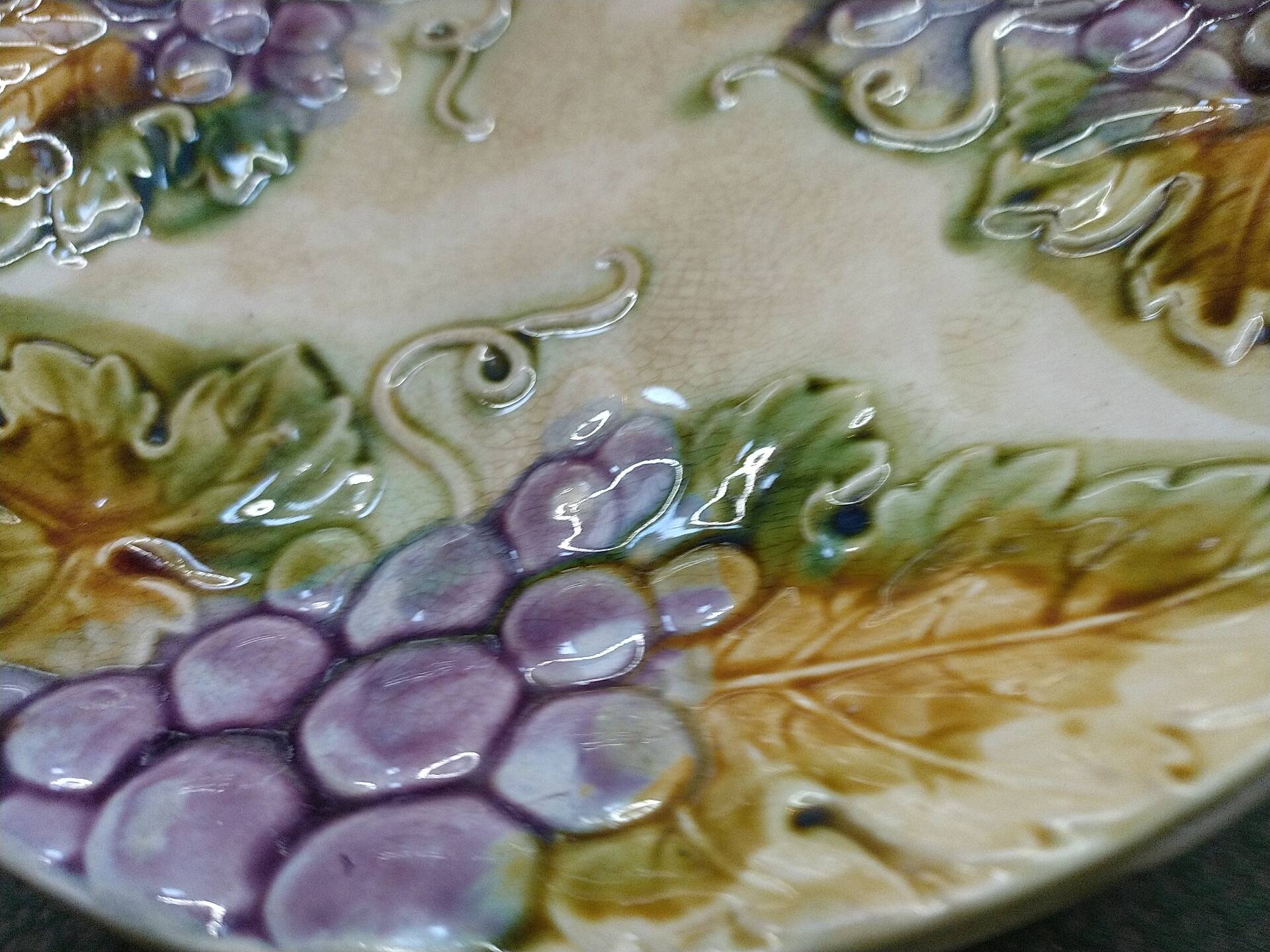 Slipware plates with vine decoration.