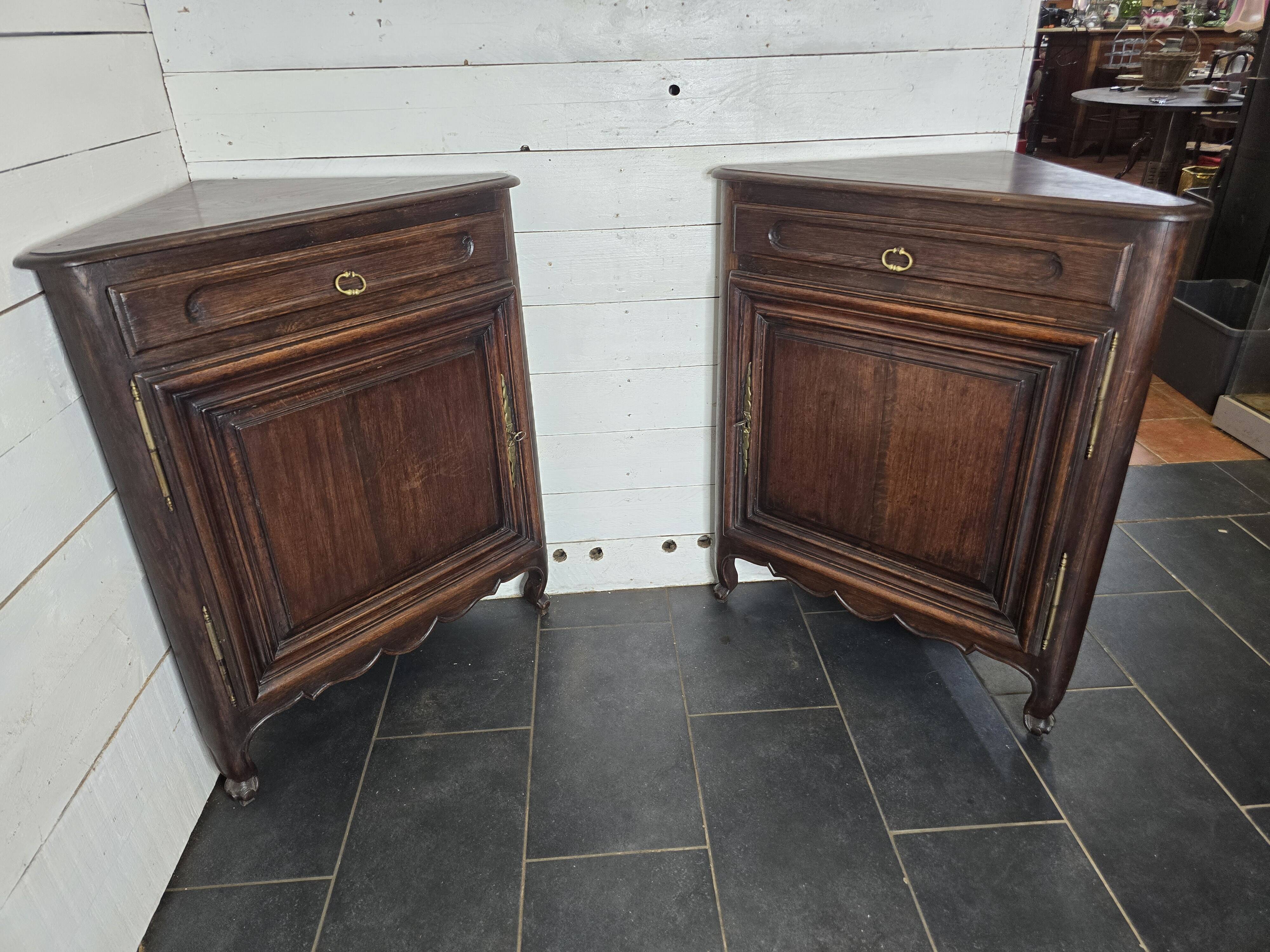 Pair of oak corner cabinets