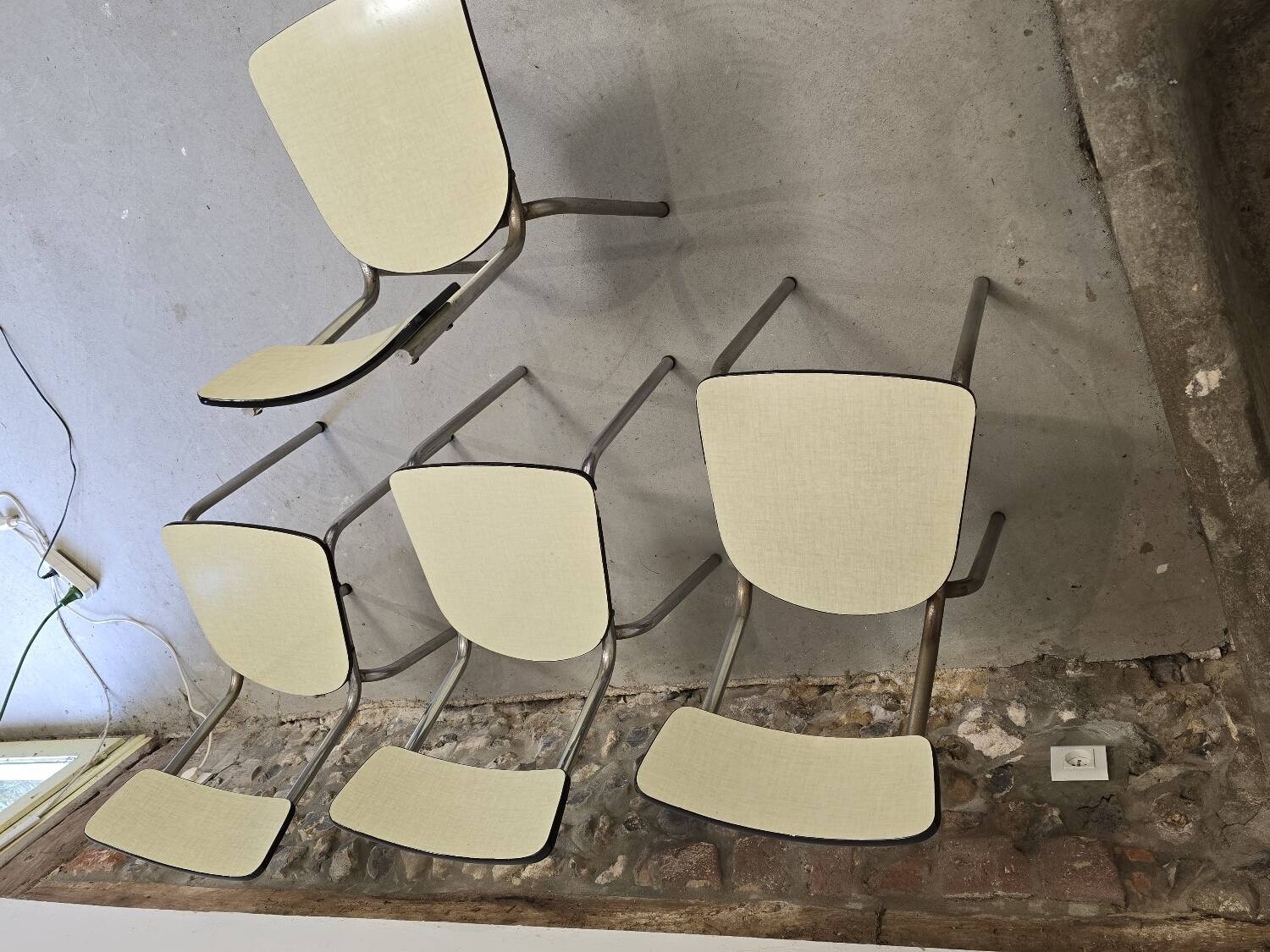 Set of 4 light yellow formica chairs