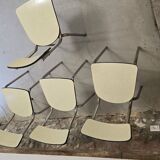 Set of 4 light yellow formica chairs