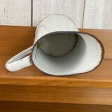 Enamelled pitcher