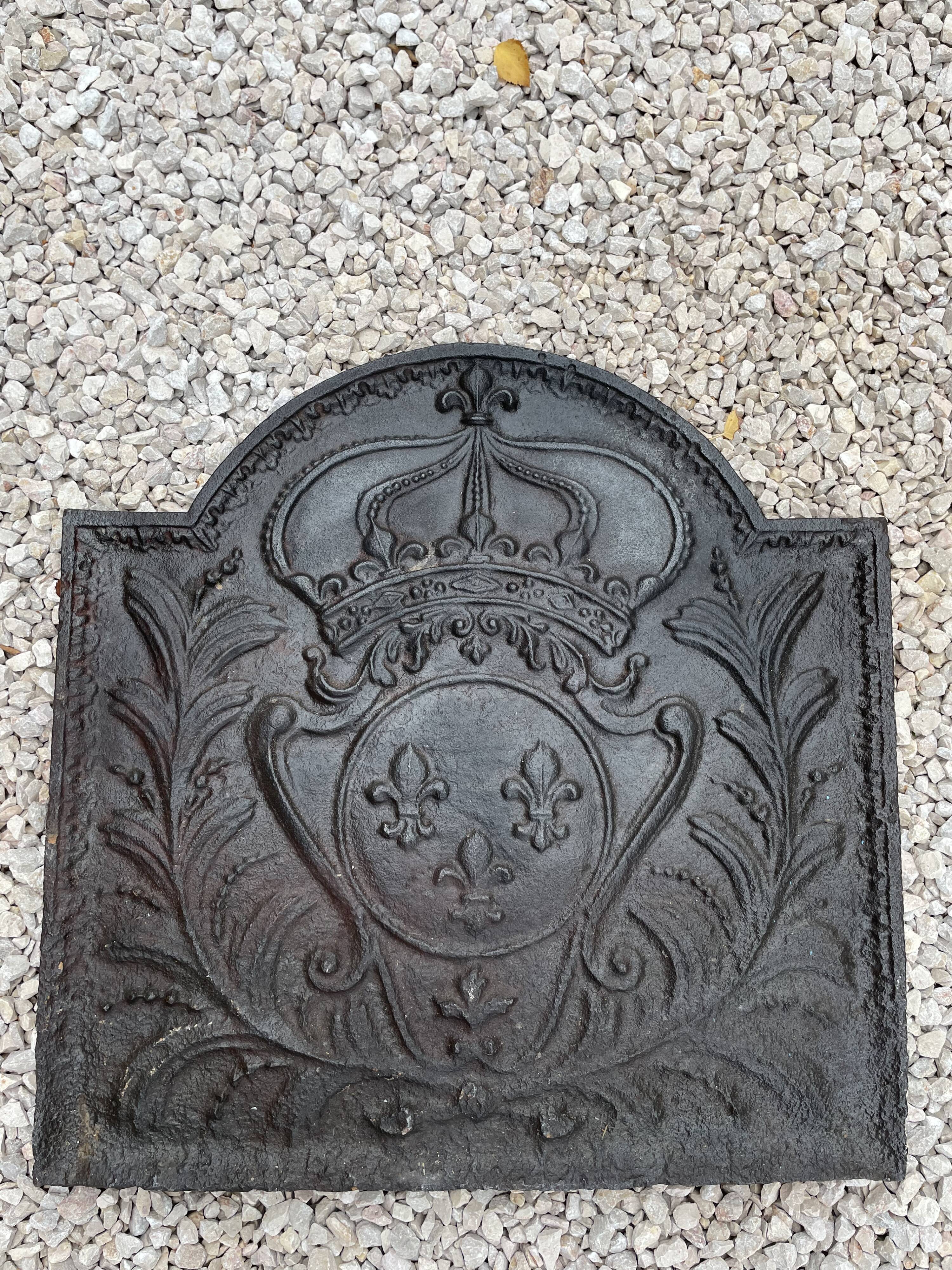 Old cast iron fireplace plate