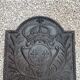 Old cast iron fireplace plate