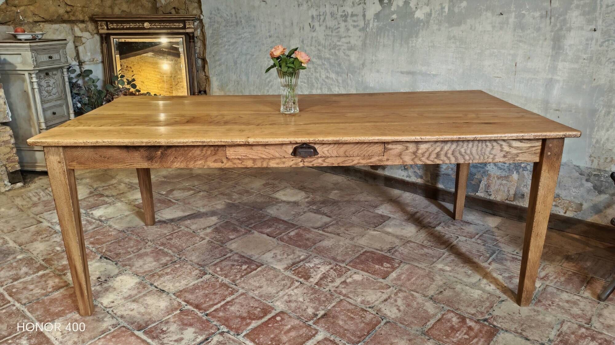 Large authentic farmhouse table made of solid French oak.