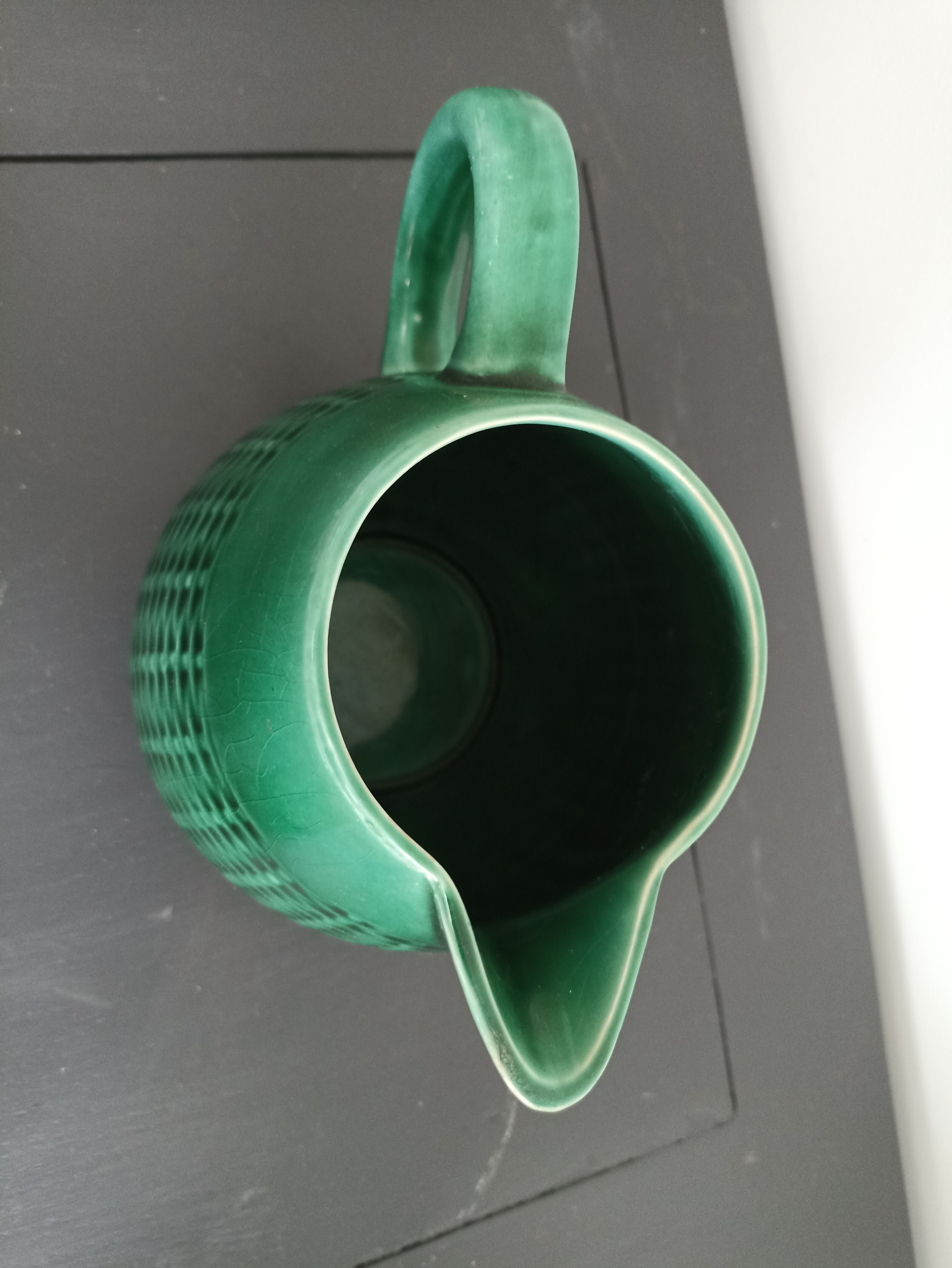 Antique ceramic milk pitcher