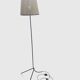 Modernist tripod floor lamp in black metal and cane from the 1950s/1960s.