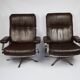 A pair of leather armchairs, 1970s
