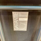 Set of 3 designer leather and metal armchairs.