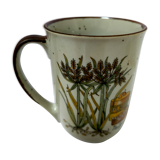 Mug in sandstone