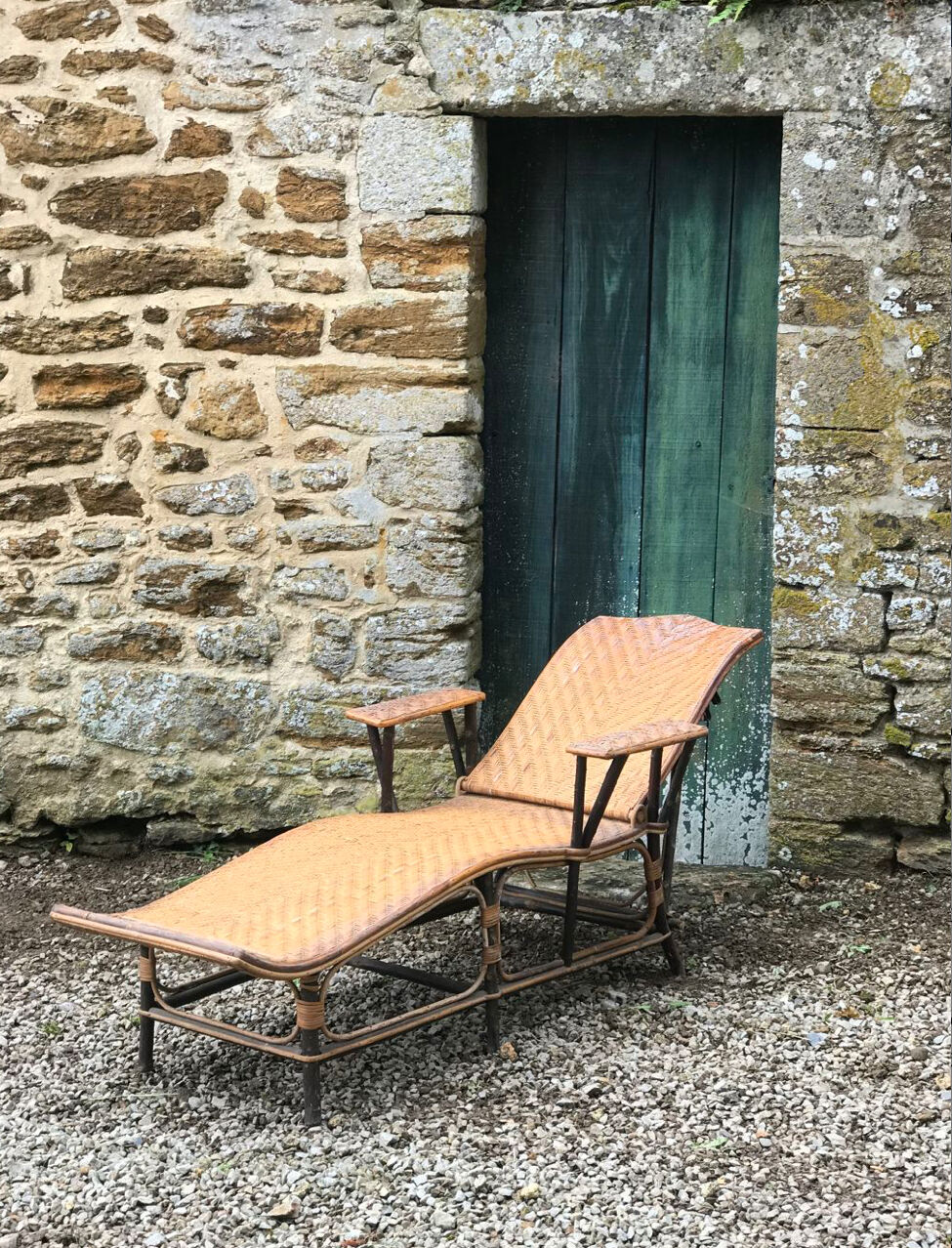 Old rattan lounger.