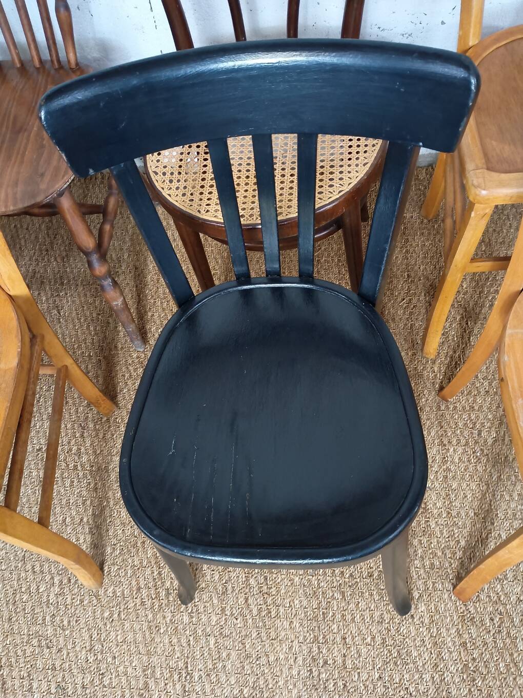Set of 8 mismatched vintage Baumann Lebrun bistro chairs.