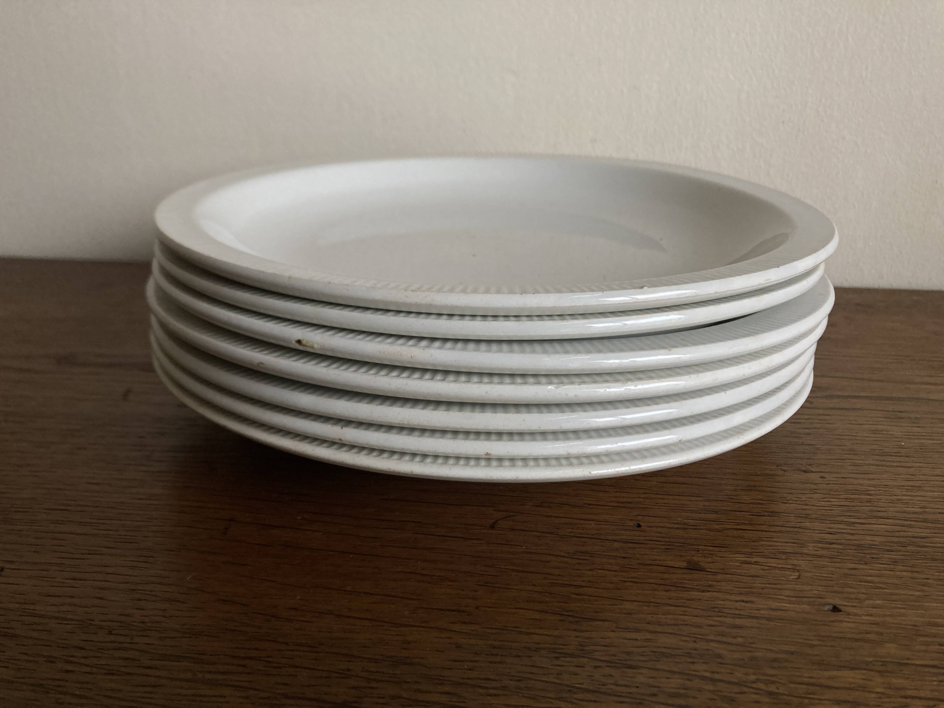 Set of 7 modernist flat plates Lunéville 1930 white earthenware