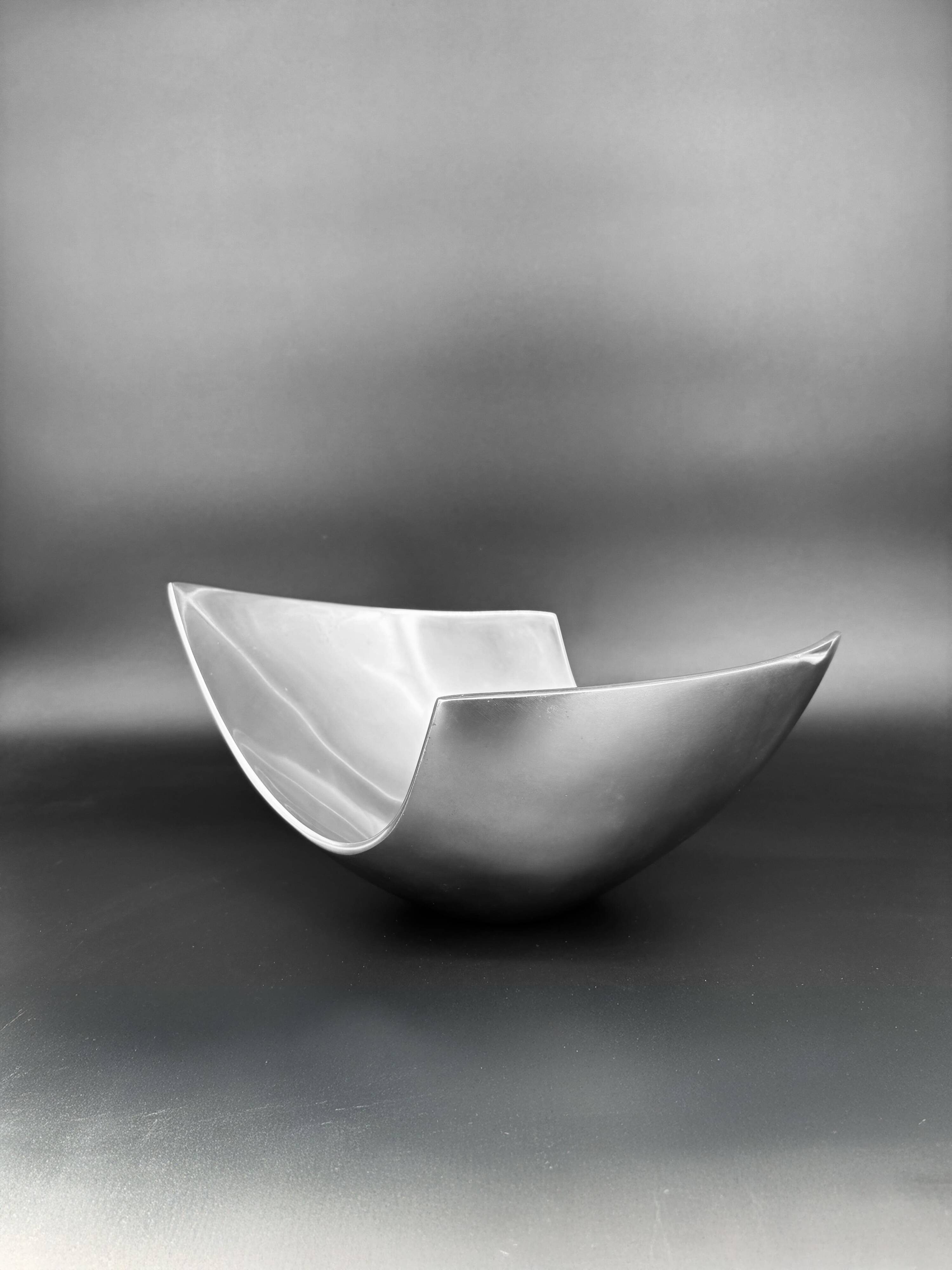 Sculptural polished aluminium bowl, in the style of Michael Lax, 1970s.