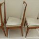 6 Vintage chairs in white beige imitation leather and solid wood with brass legs