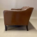 Scandinavian design 2-seater leather sofa.