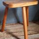 Solid wood tripod stool from the 50s