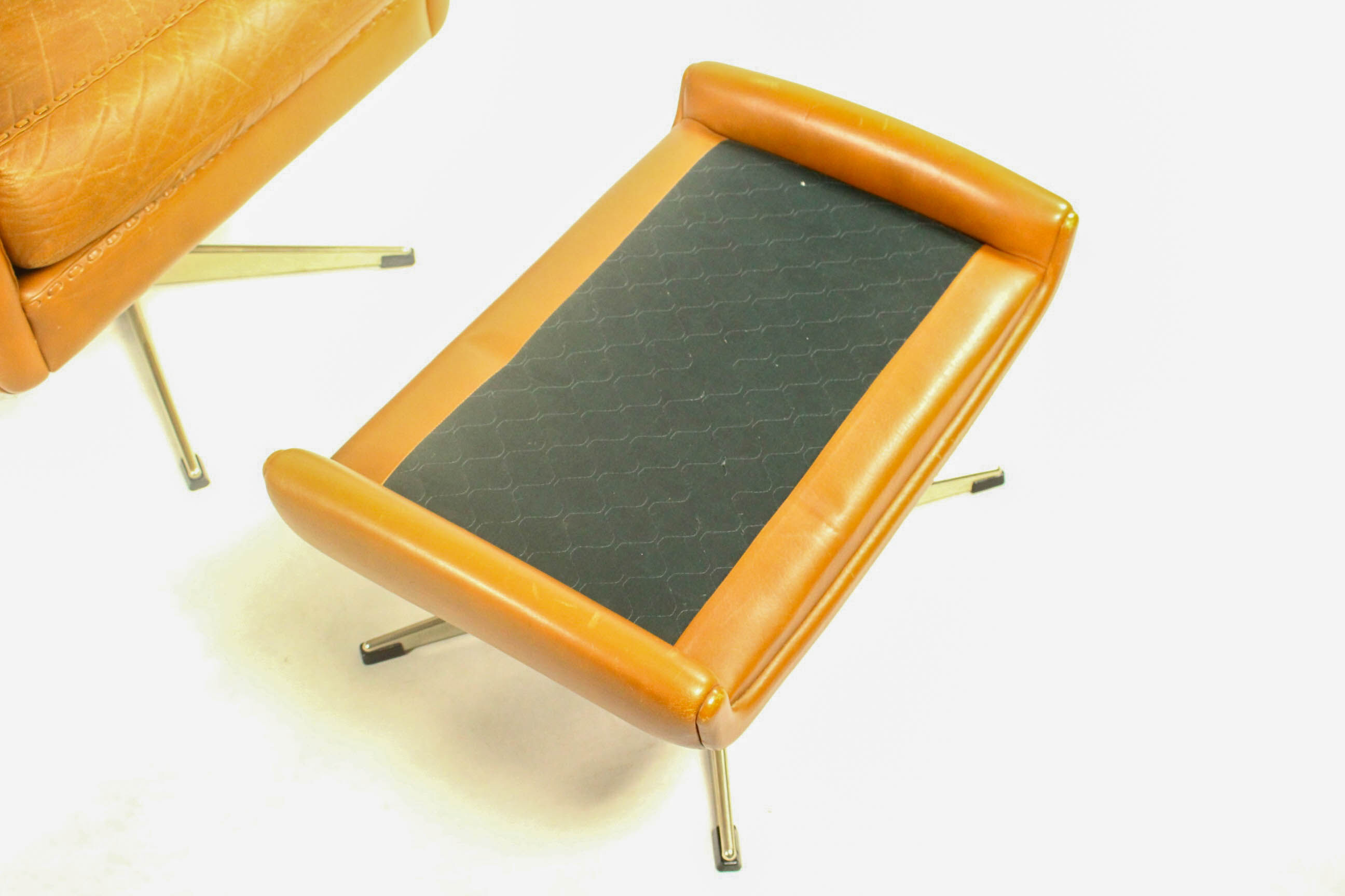 Matador swivel leather chair with ottoman by Aage Christiansen for Erhardsen & Andersen, 1960s