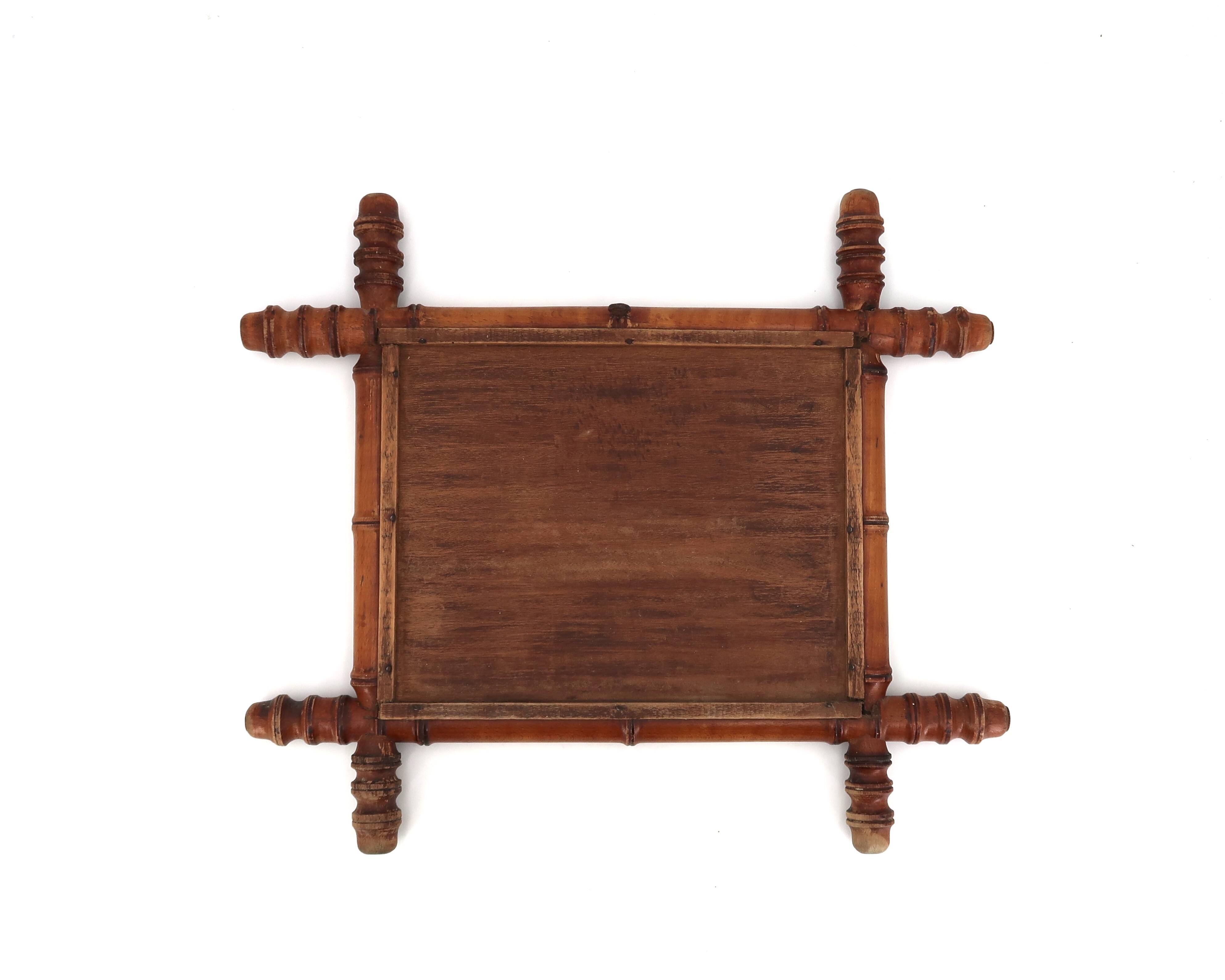 Small wall mirror in turned wood in a faux bamboo style, 1930s.