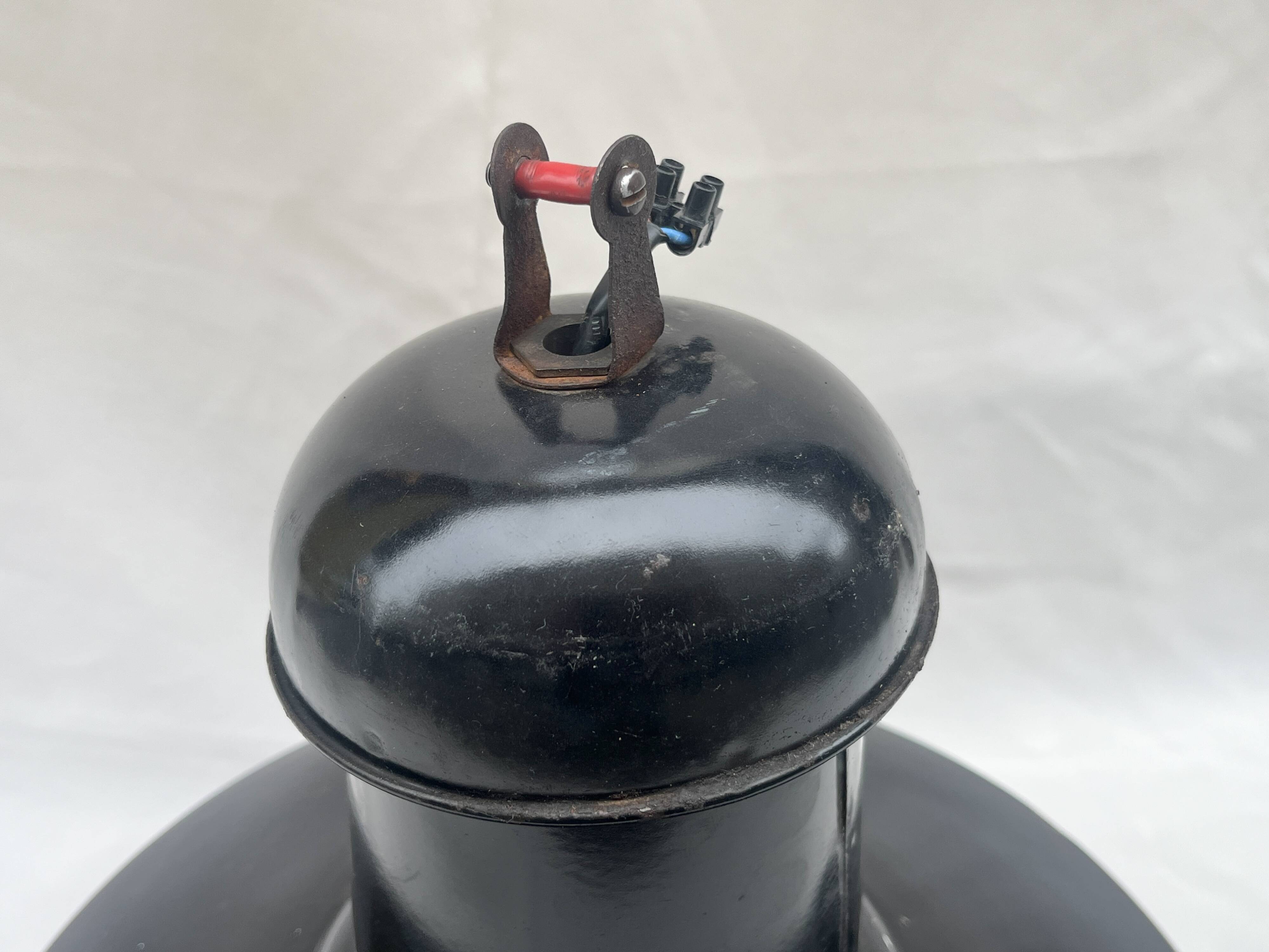 Industrial pendant light in black and white enamelled sheet metal factory bowl