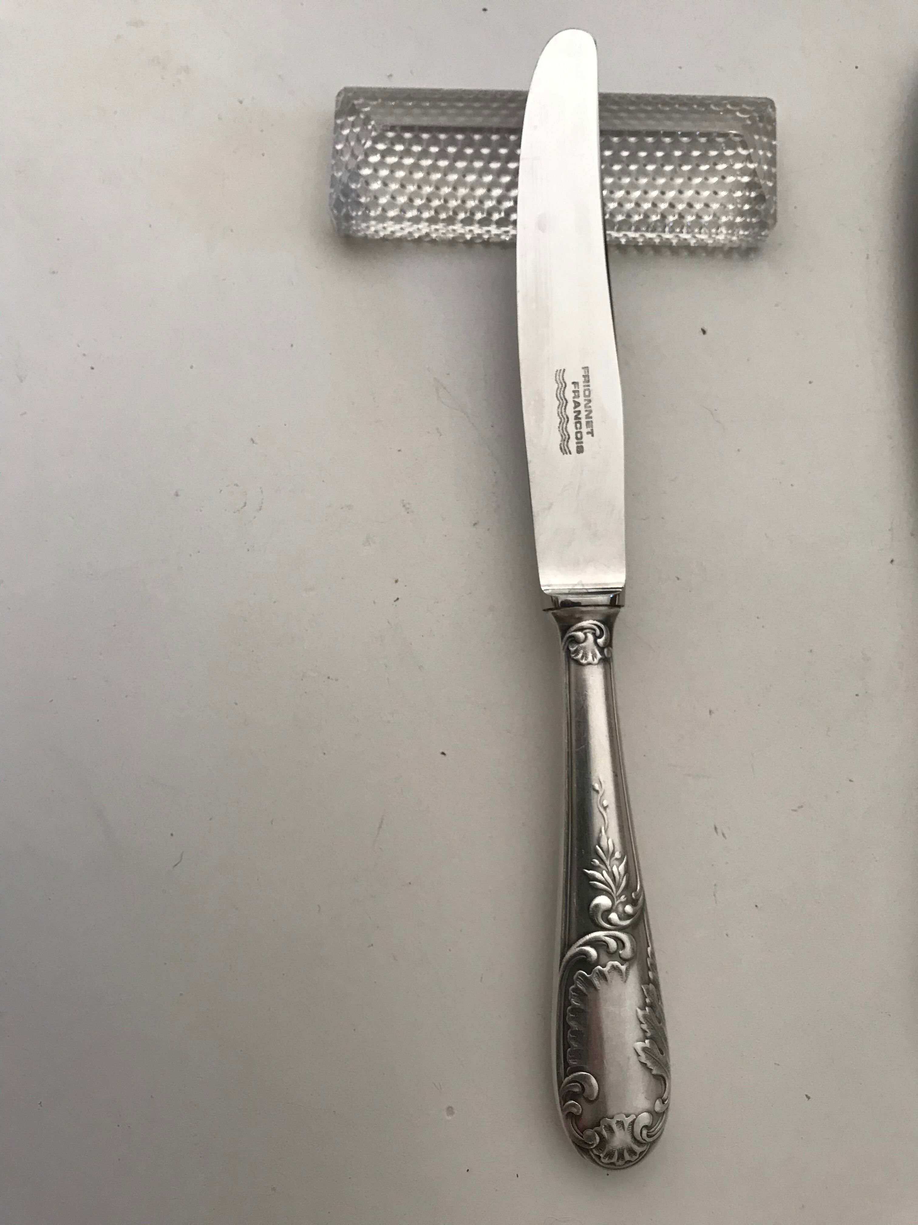 10 Series of 10 silver metal knives François Frionnet