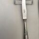 10 Series of 10 silver metal knives François Frionnet