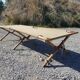 Ancien lit de camp militaire en bois et toile