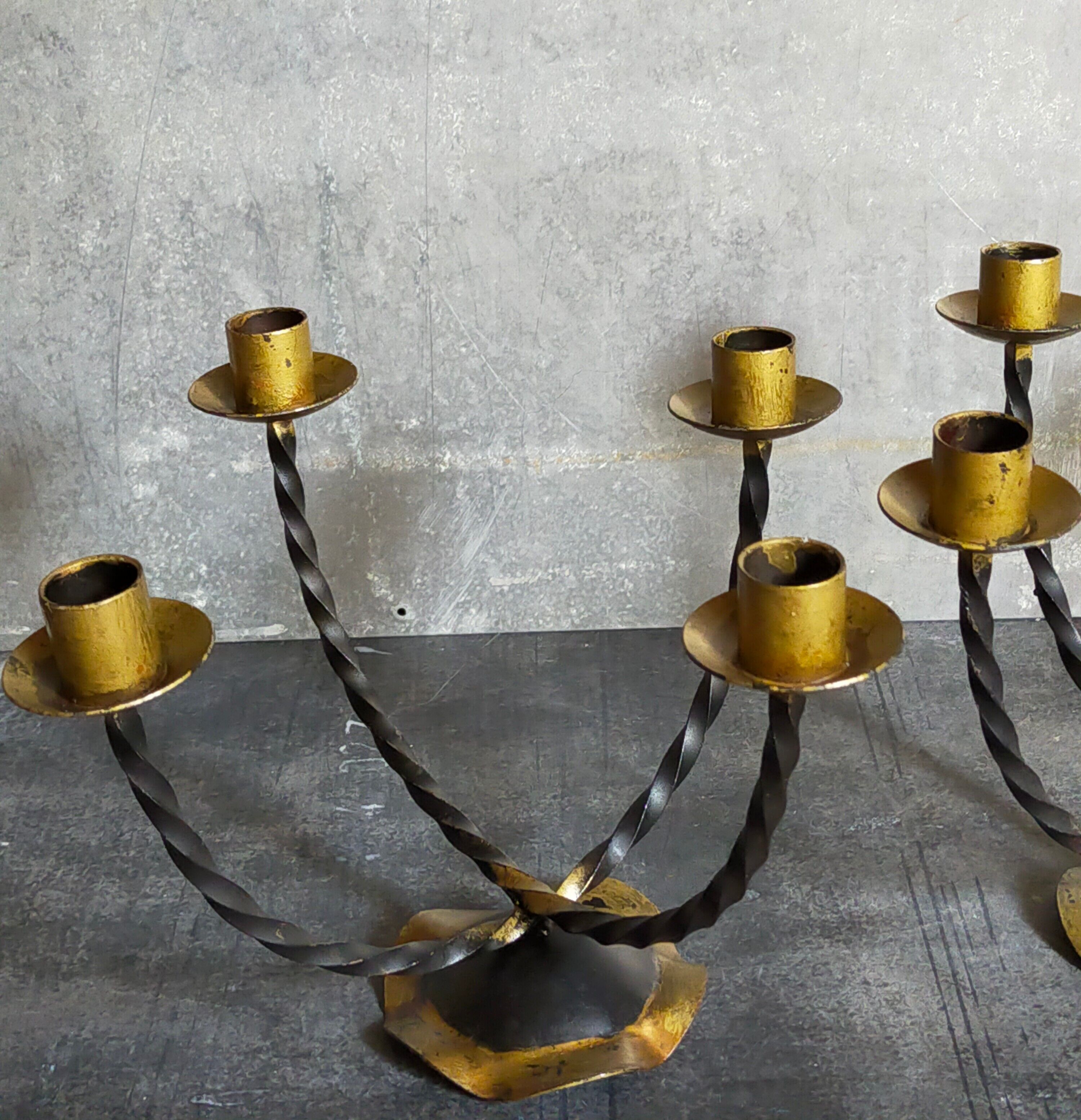 Pair of wrought iron candle holders four arms 50s