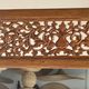 Very large freestanding teak mirror with an openwork carved pediment, Indonesia.